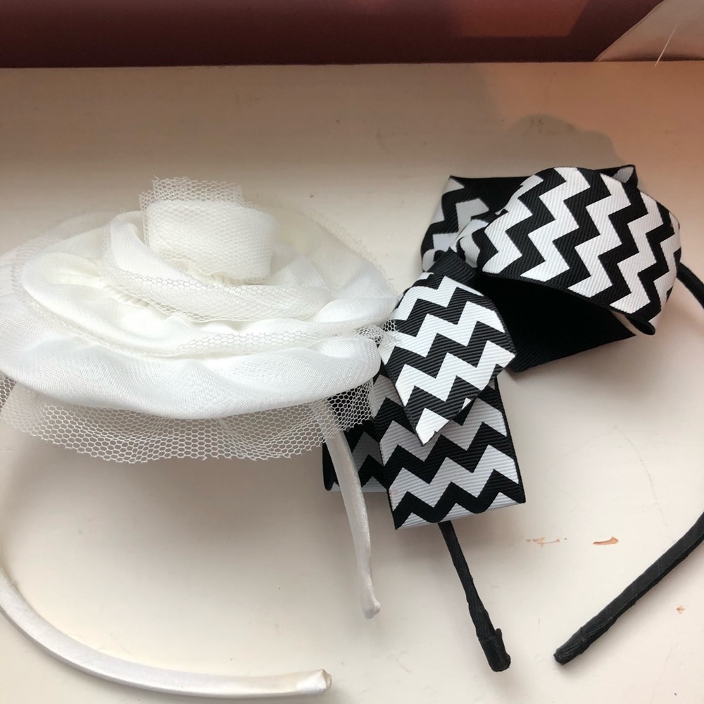 Two fancy head kid head bands